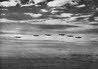 Formation of Lockheed P-38 Lightnings from the front 