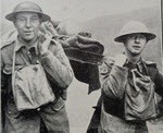 R.A.M.C. Orderlies carrying wounded German 