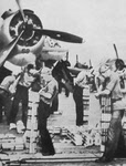 Loading Incendiary Bombs on Grumman Avenger for raid on Tarawa 